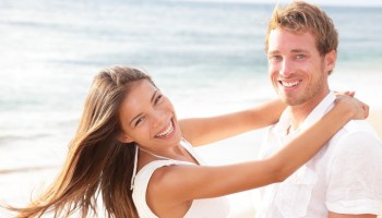 bigstock-Happy-couple-on-beach-in-love-46230418